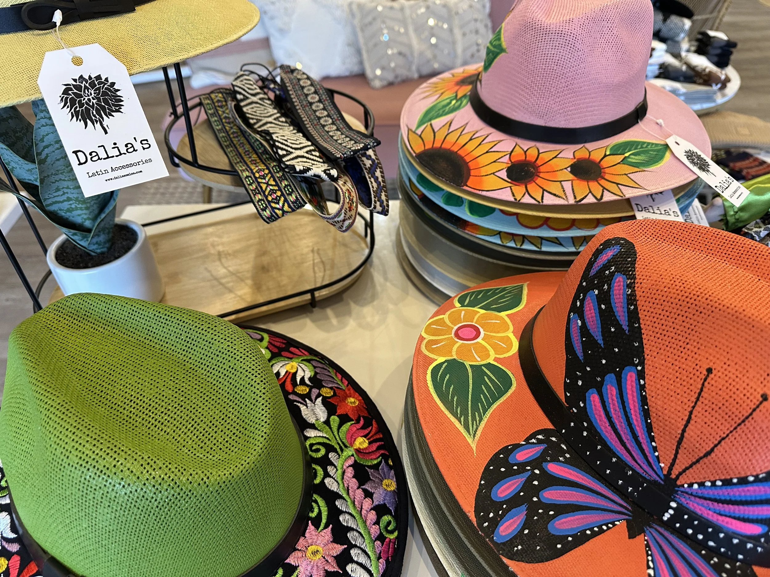 Green hand-embroidered floral Latin accessory hat worn in snowy Alaska
